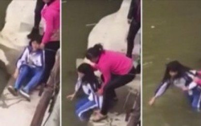 VEJA VÍDEO: Mãe tenta afogar filha em rio por causa de notas baixas na escola